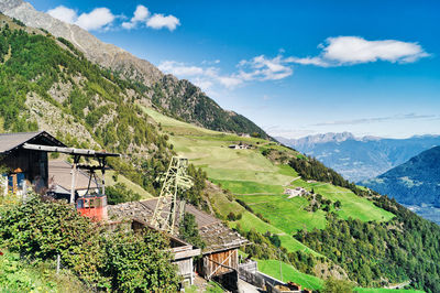 Scenic view of landscape and mountains against sky