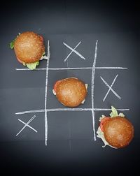 Close-up of burger on black background