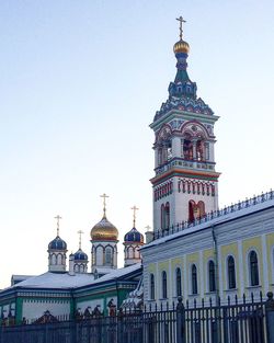 View of buildings against sky in city