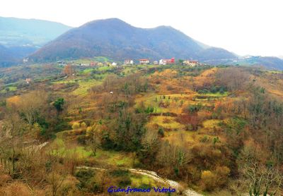 Scenic view of landscape against sky during autumn