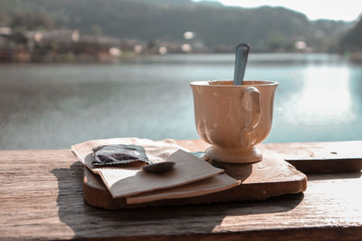 Close-up of coffee cup on table