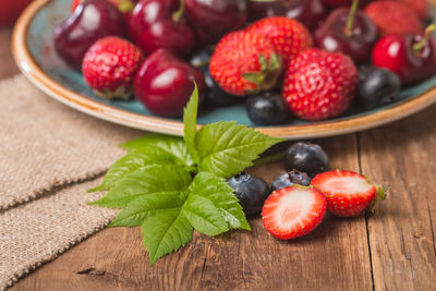 High angle view of strawberries on table