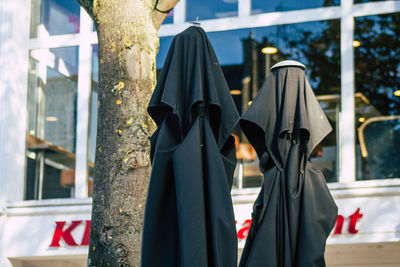 Clothes hanging on clothesline against building