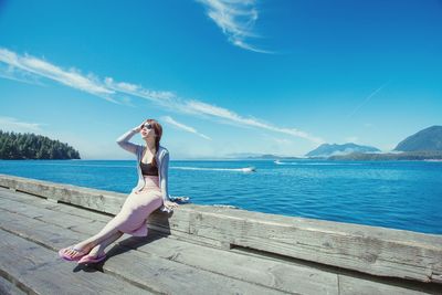 Scenic view of sea against blue sky