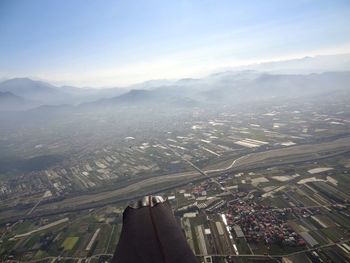 Aerial view of cityscape against sky