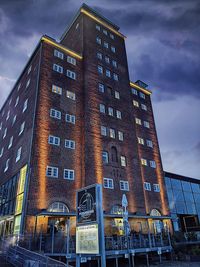 Low angle view of modern building against sky