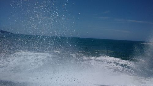 Close-up of sea against sky at night