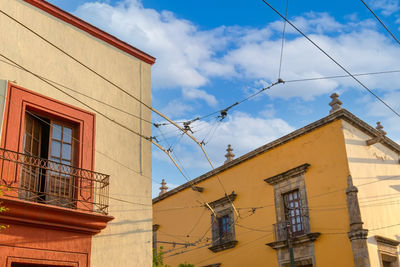 Low angle view of residential building against sky