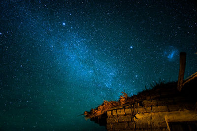 Low angle view of star field against sky at night