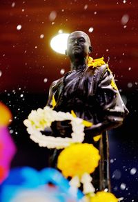 Statue of people in water