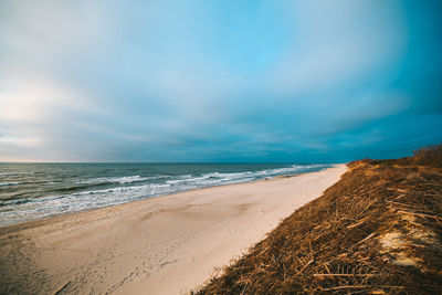 Scenic view of beach against sky