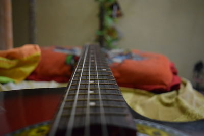 Close-up of hand playing guitar