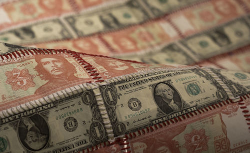 Close-up of stitched currency