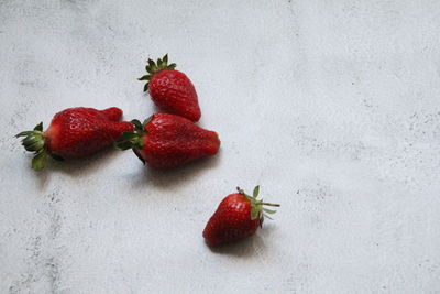 Close-up of strawberry against white background