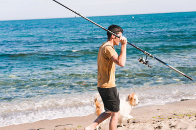 Full length of a dog on beach