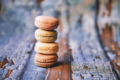 Macarons on wooden background