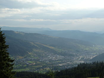 High angle view of mountain range against sky in foggy weather