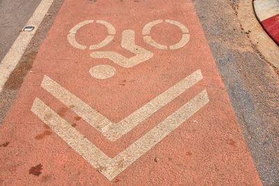 High angle view of text on road