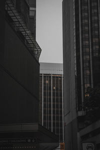 Low angle view of modern buildings against clear sky