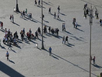 High angle view of people walking on street