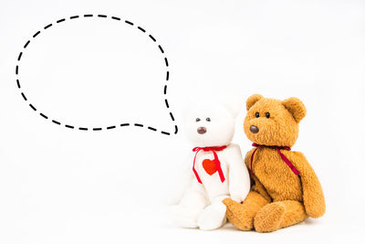 Close-up of stuffed toy against white background