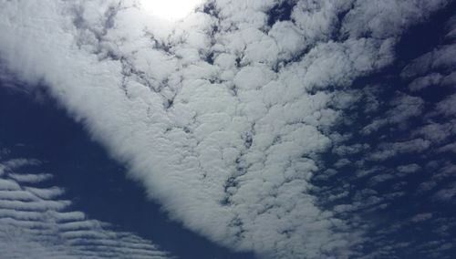 Low angle view of snow against sky