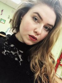 Portrait of beautiful woman at home