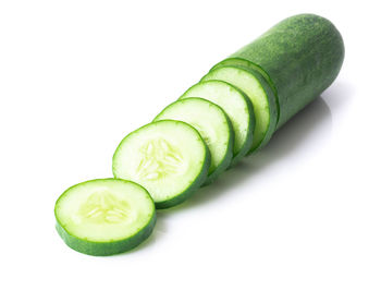 Close-up of green pepper against white background