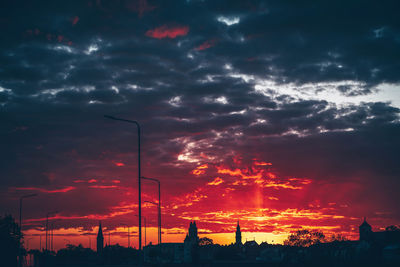 Low angle view of dramatic sky during sunset