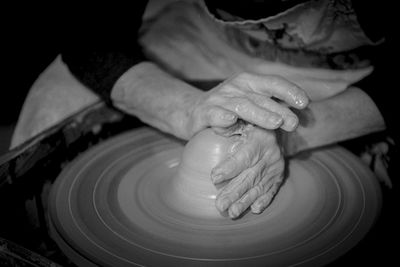 Midsection of person working