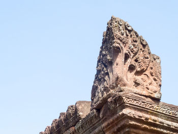 Low angle view of sculpture against clear sky