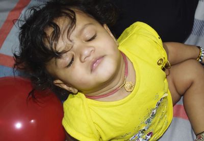 Close-up of cute girl smiling