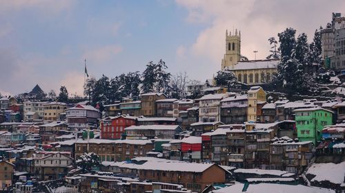 Cityscape against sky during winter