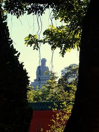 Low angle view of statue against clear sky