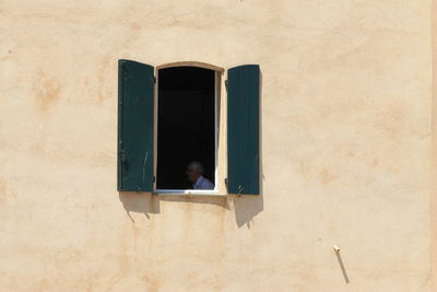 Full frame shot of window on wall