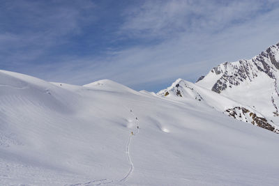 Snowcapped mountains against sky