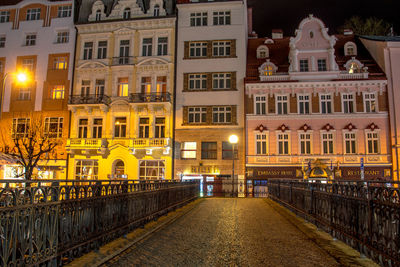 Illuminated buildings in city at night