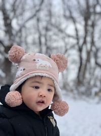 Portrait of cute girl in snow