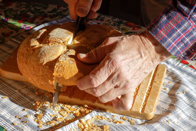 Close-up of person preparing food