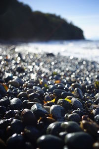 Close-up of stones on beach