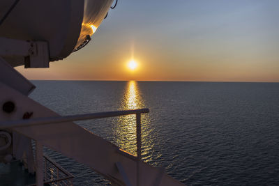 Scenic view of sea against sky during sunset from a ferry boat