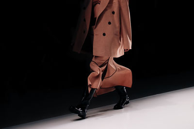 Low section of woman standing on floor