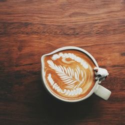 Directly above shot of cappuccino on table