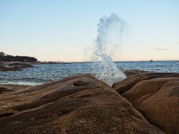 Scenic view of sea against clear sky