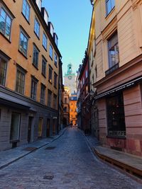 Narrow alley along buildings