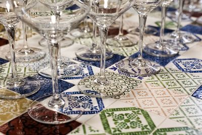 High angle view of wine glasses on table