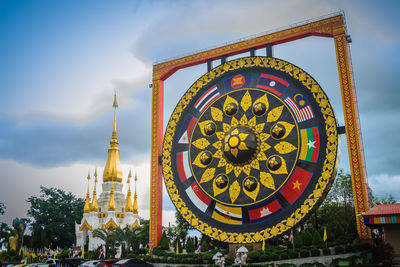 View of temple against building