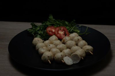 Close-up of vegetables in plate on table