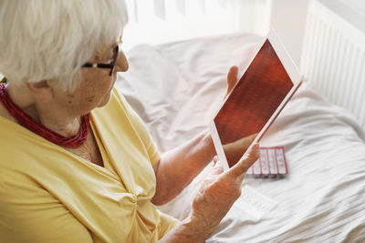 Senior woman using digital tablet