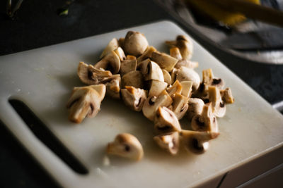 High angle view of chopped vegetables in plate on table
